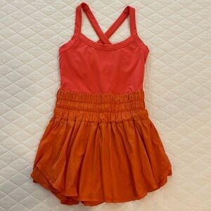 Free People runsie skortsie onesie one piece size small orange